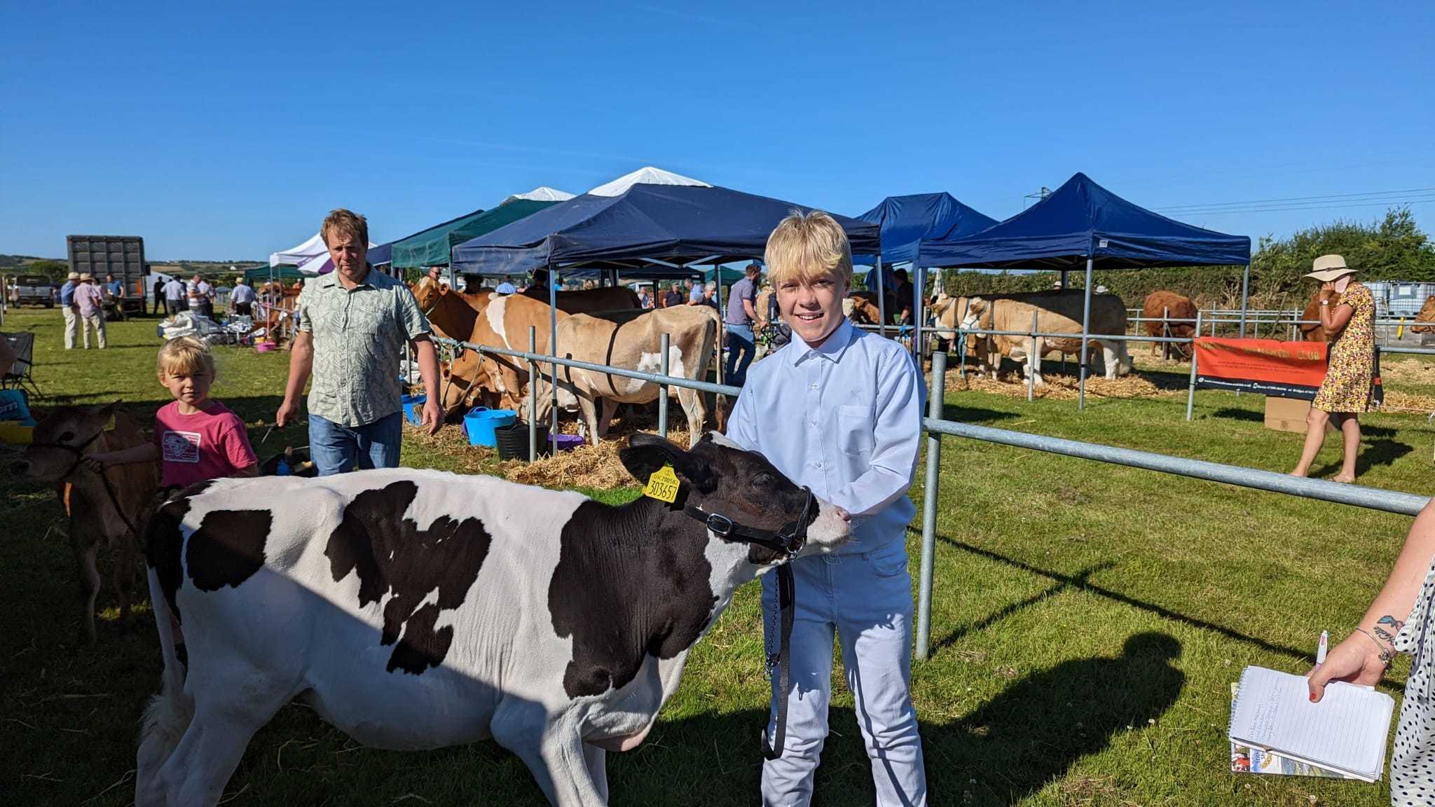 Harvey Johns, 13 showing one of the calfs from Johns Family, Trenoweth Farm